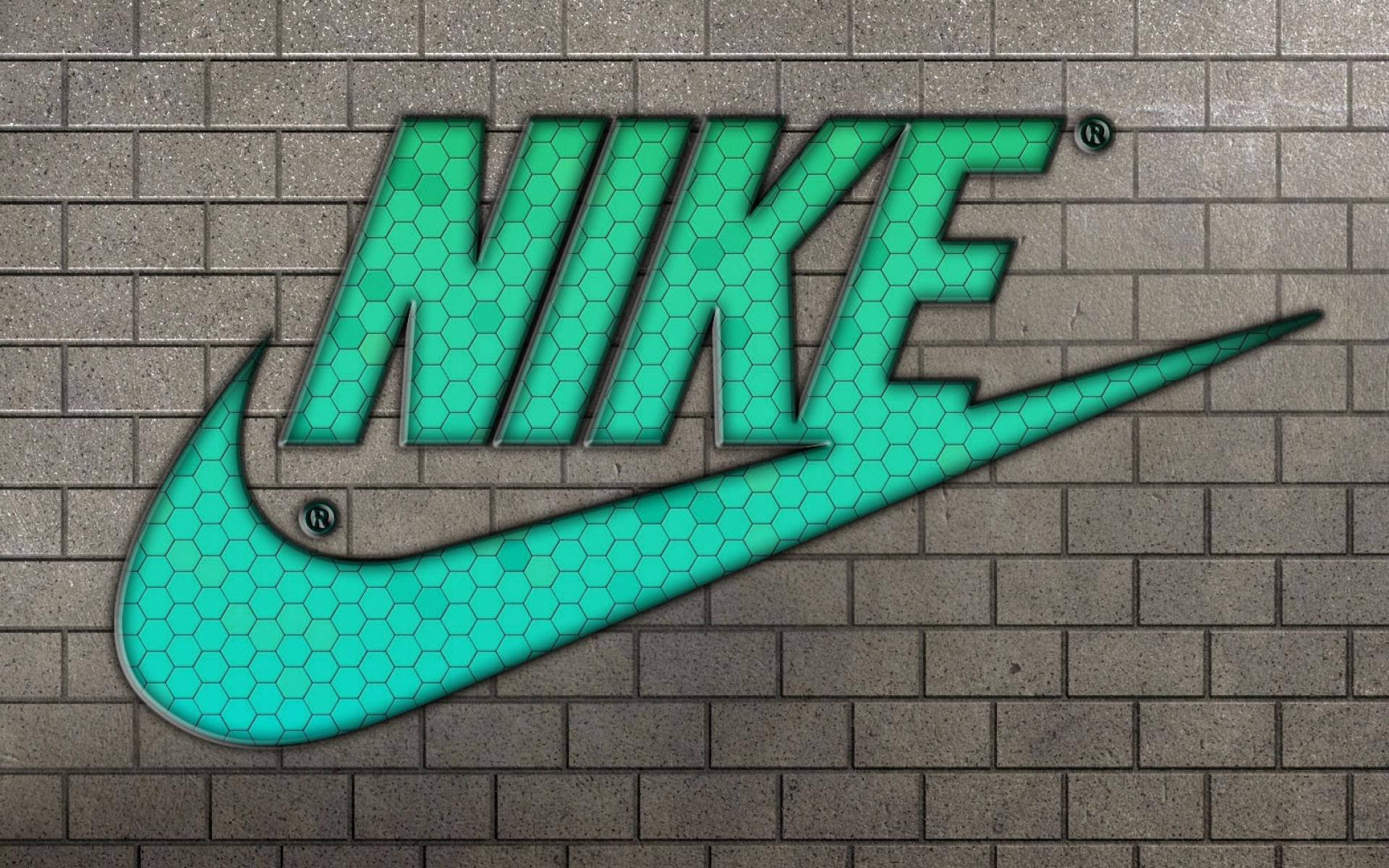 Nike Logo On A Brick Wall Background