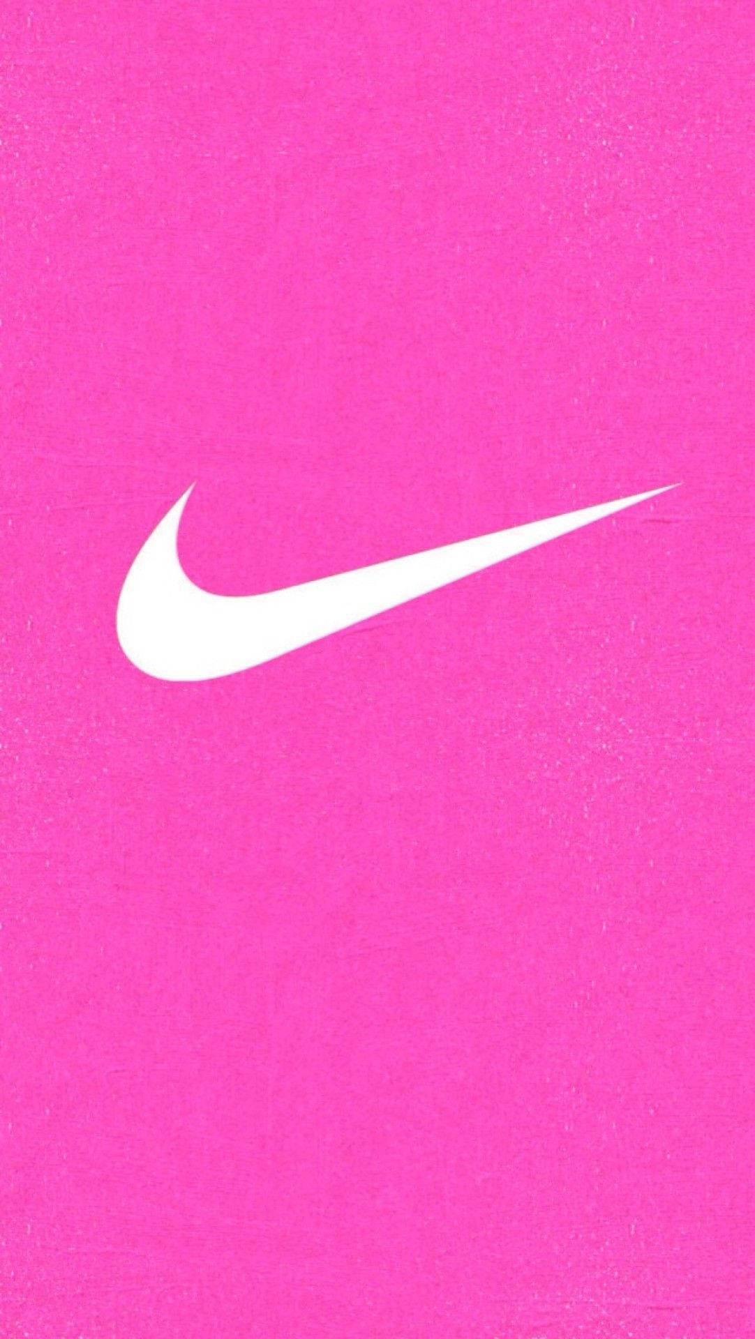 Nike Logo On A Pink Background Background