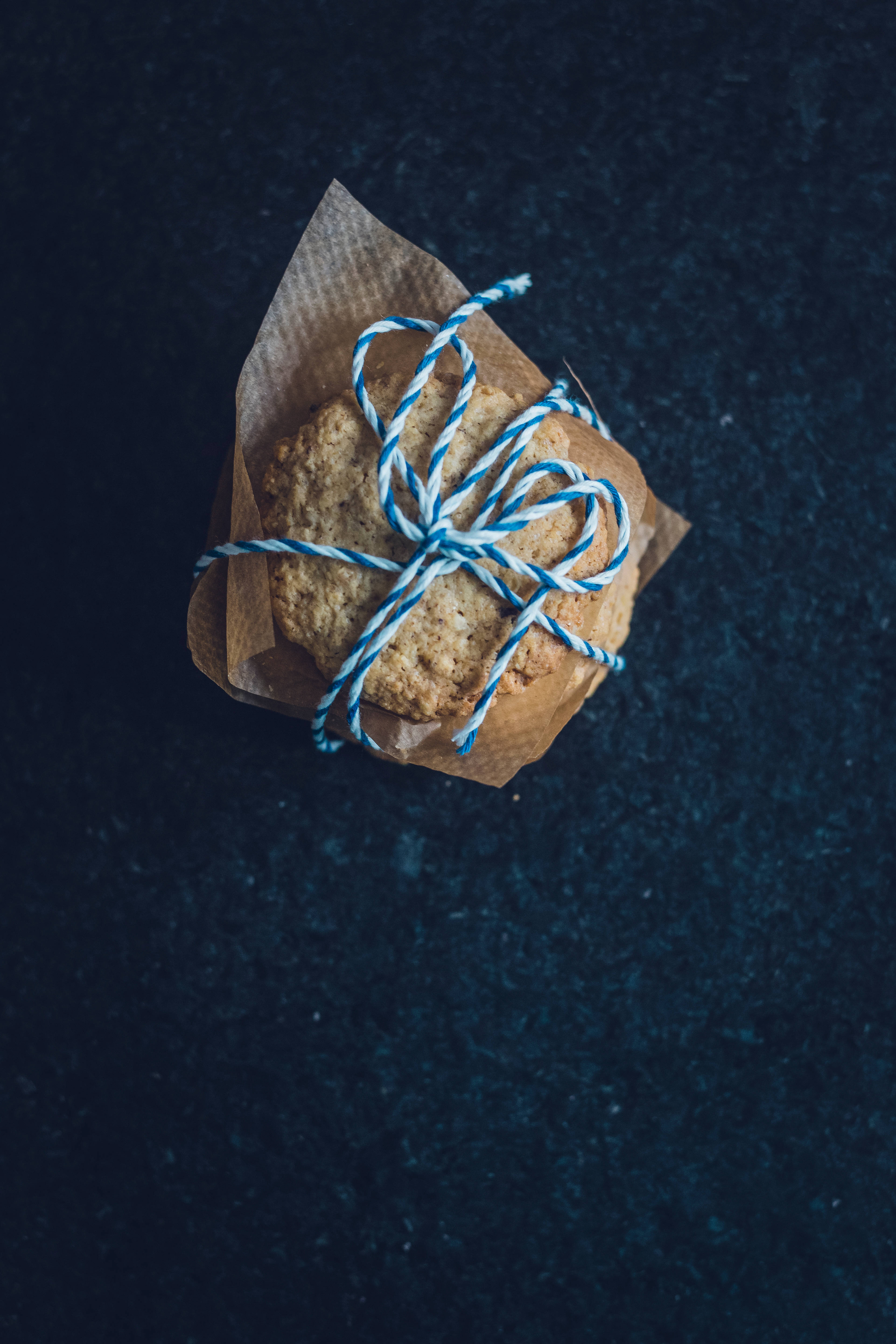 Download Oatmeal Cookie Pastries On Napkin Wallpaper | Wallpapers.com