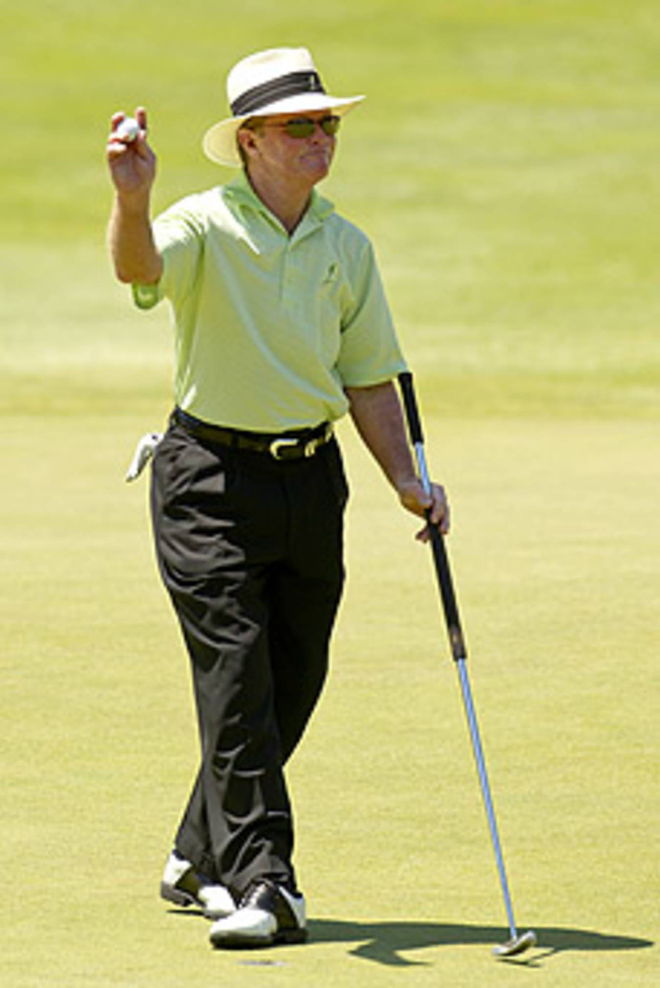 Download Golfer Tom Kite In Pink Stripe Wallpaper