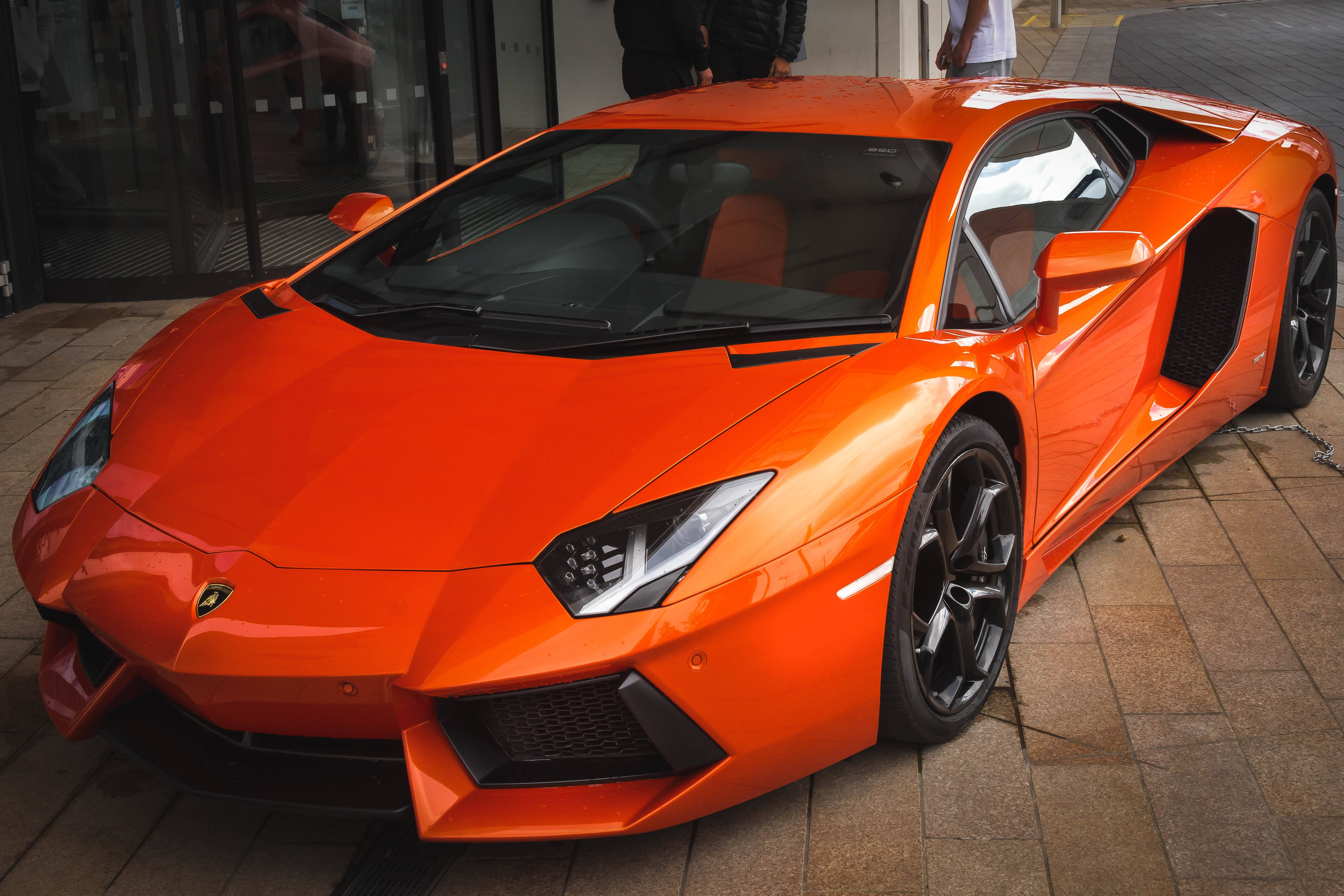Orange Lamborghini Aventador Front And Side Background