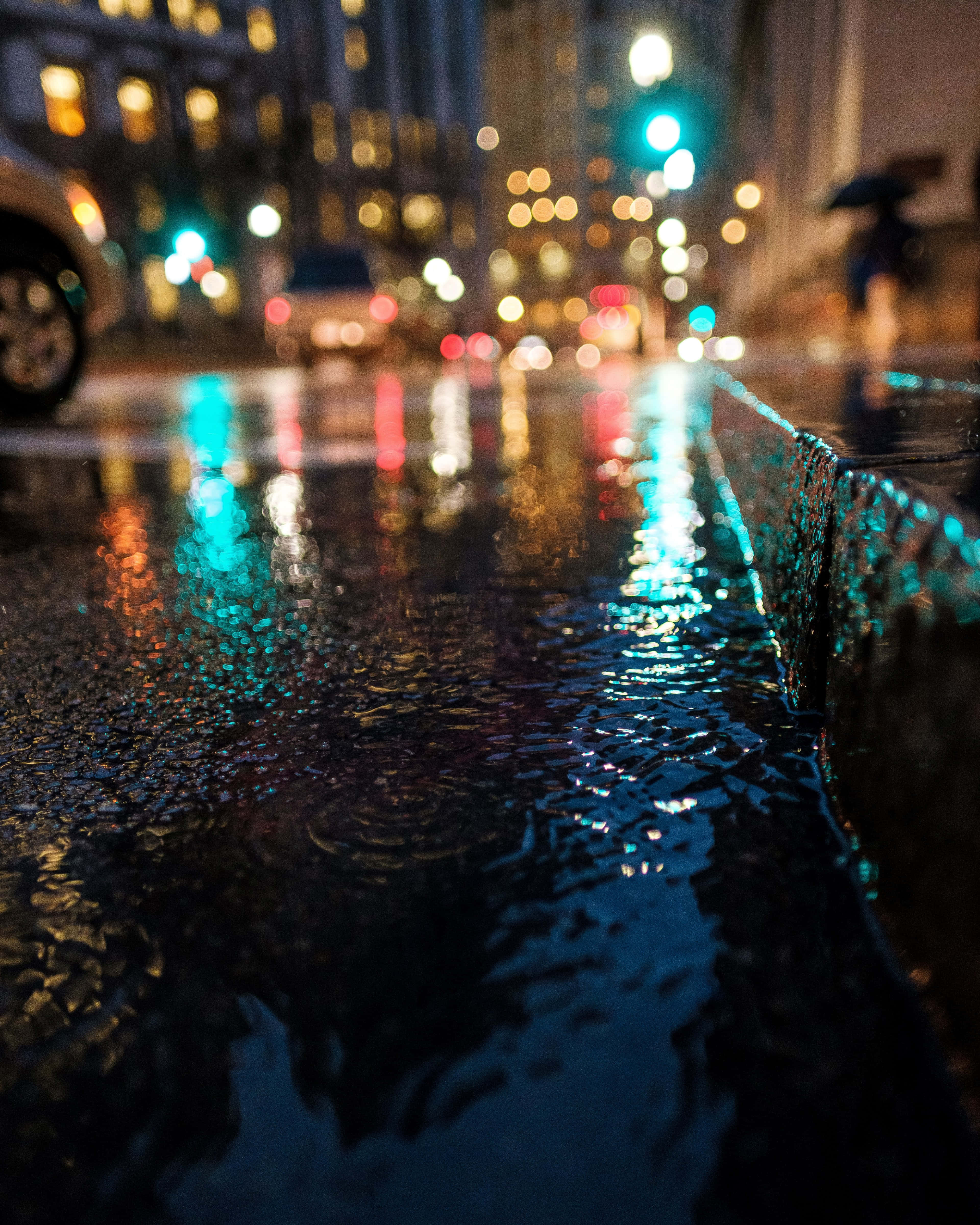 Download Image An Immersive View Of A Rainy Cityscape Wallpaper 