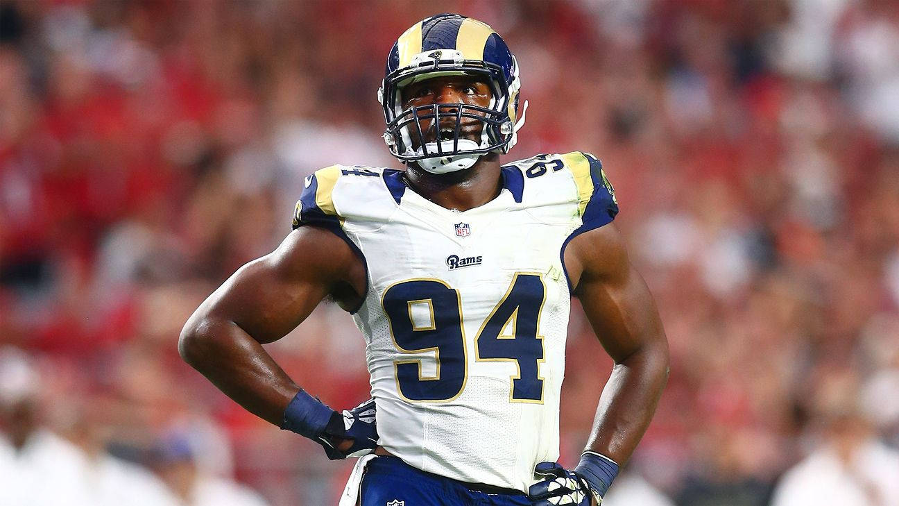 Download Robert Quinn Hands On Hips Wallpaper | Wallpapers.com