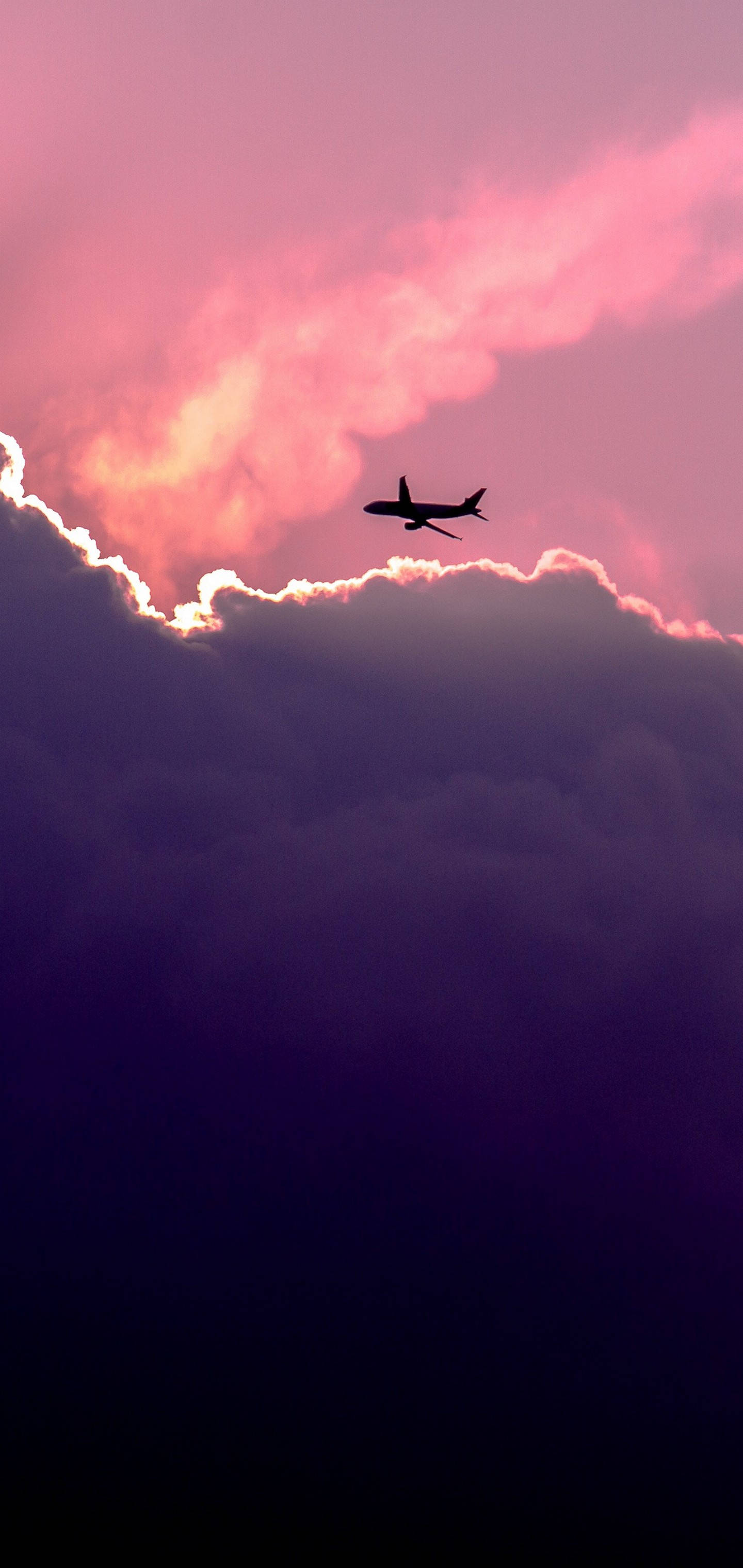 S10 Pink Sky Airplane Silhouette Background