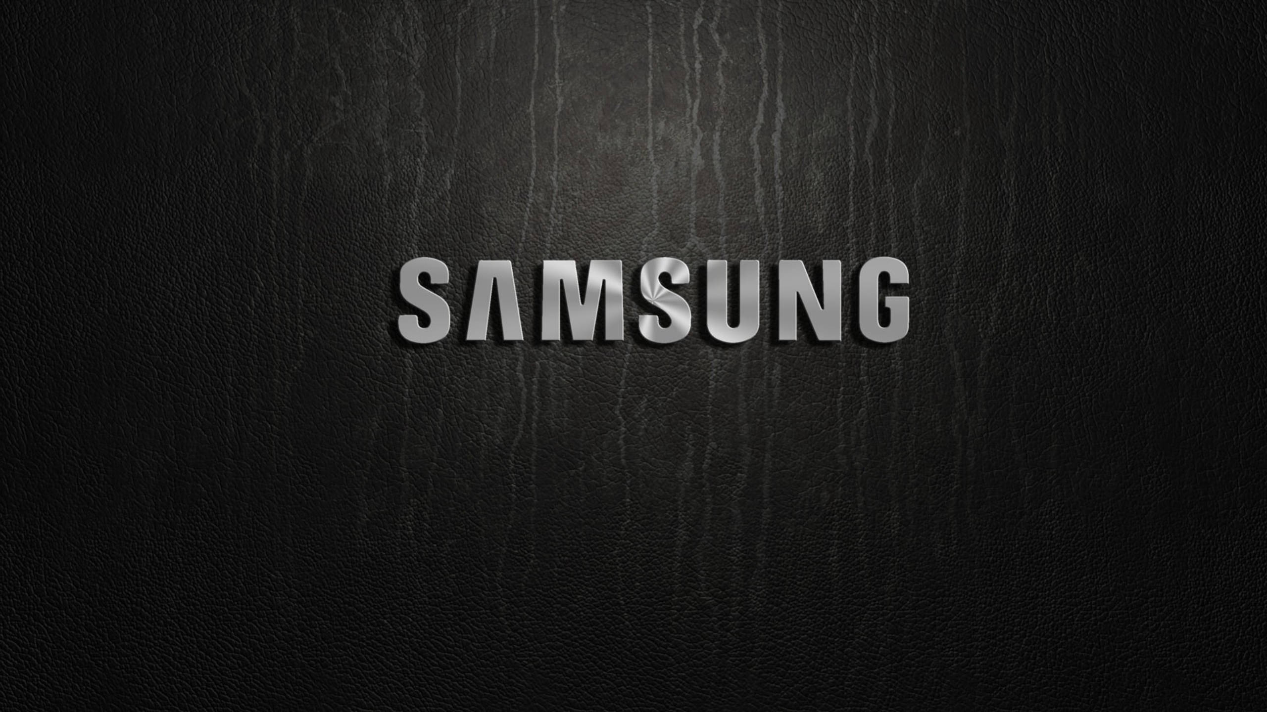 Silver Samsung Name Logo In Black Background