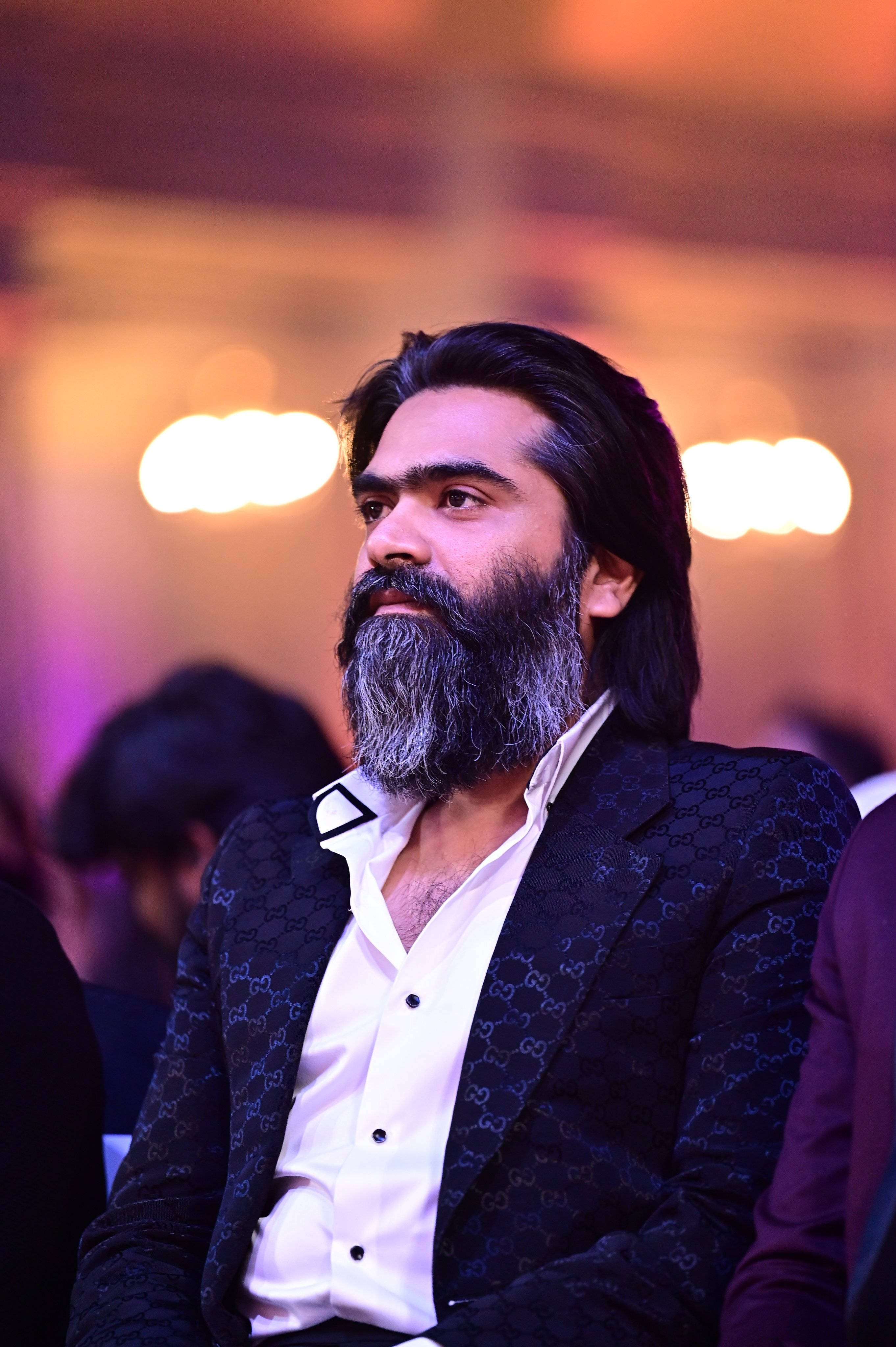 Download Indian Actor Simbu Displaying His Mature Charm In Gray Beard