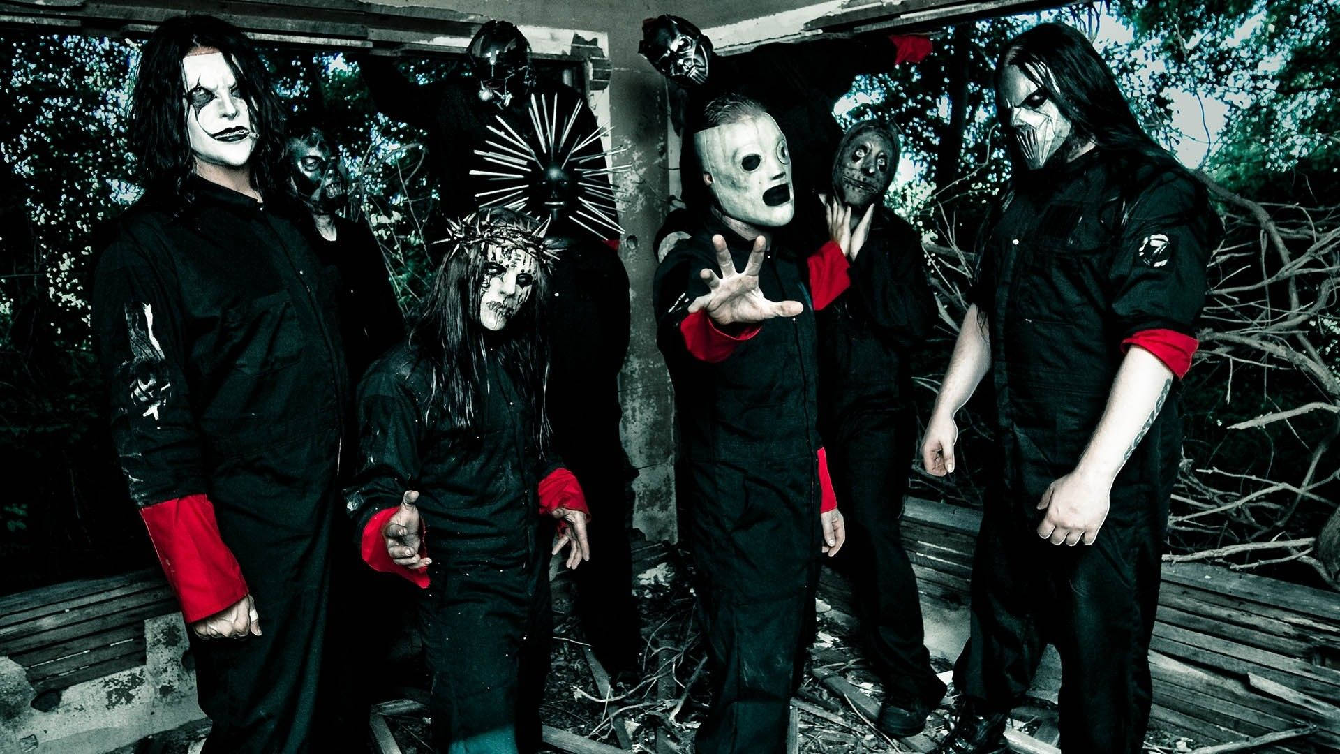 Slipknot Members Full Outfit Posing Background