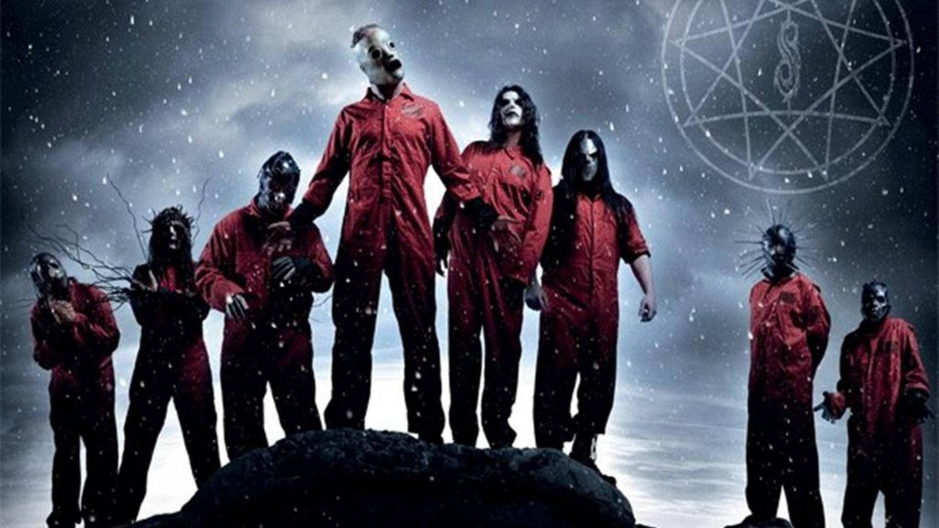 Slipknot Members In Prisoner Suit Background