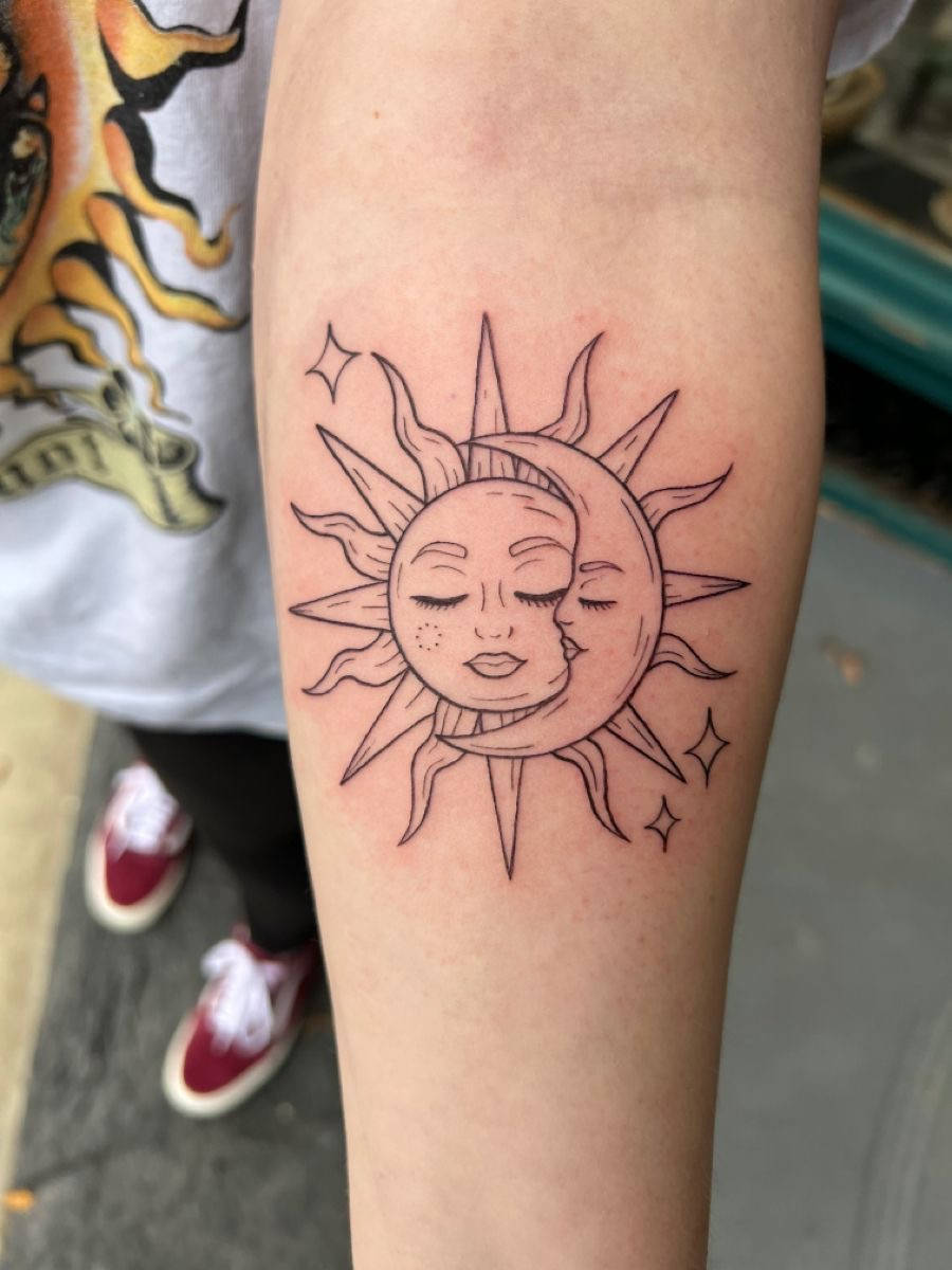moon and sun together tattoo