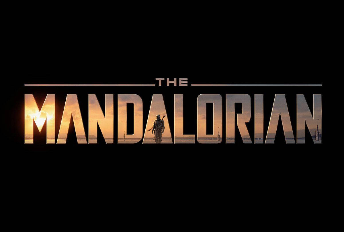 The Mandalorian Logo On A Black Background Background