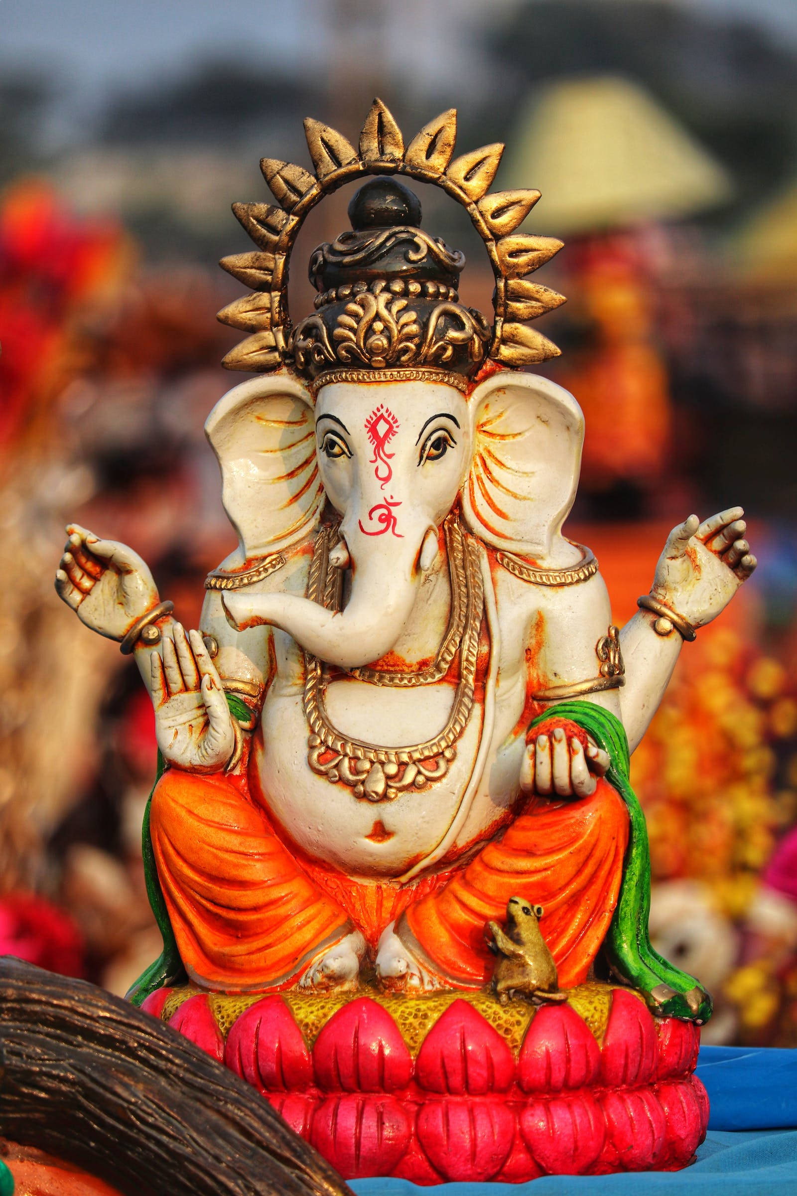 Download Tiny God Ganesh Figurine Wallpaper 