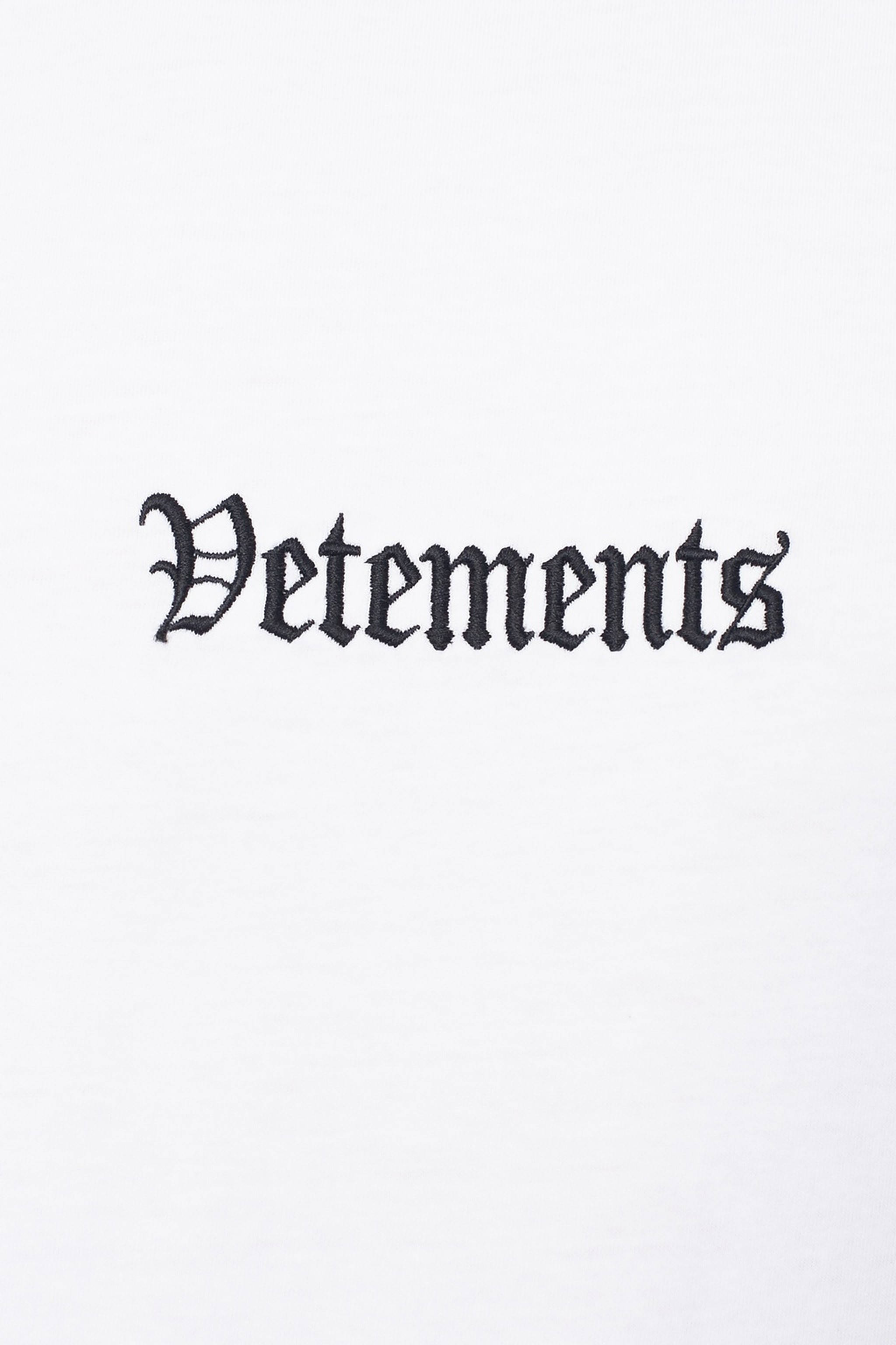 Download Vetements Embroidered On White Wallpaper | Wallpapers.com