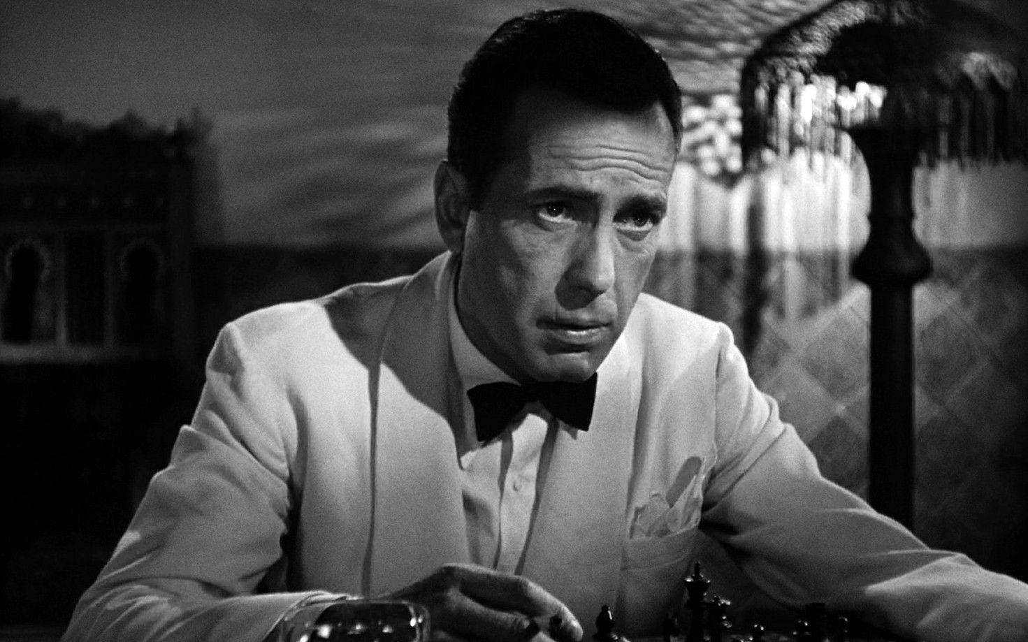 Download White Suit Humphrey Bogart Wallpaper | Wallpapers.com