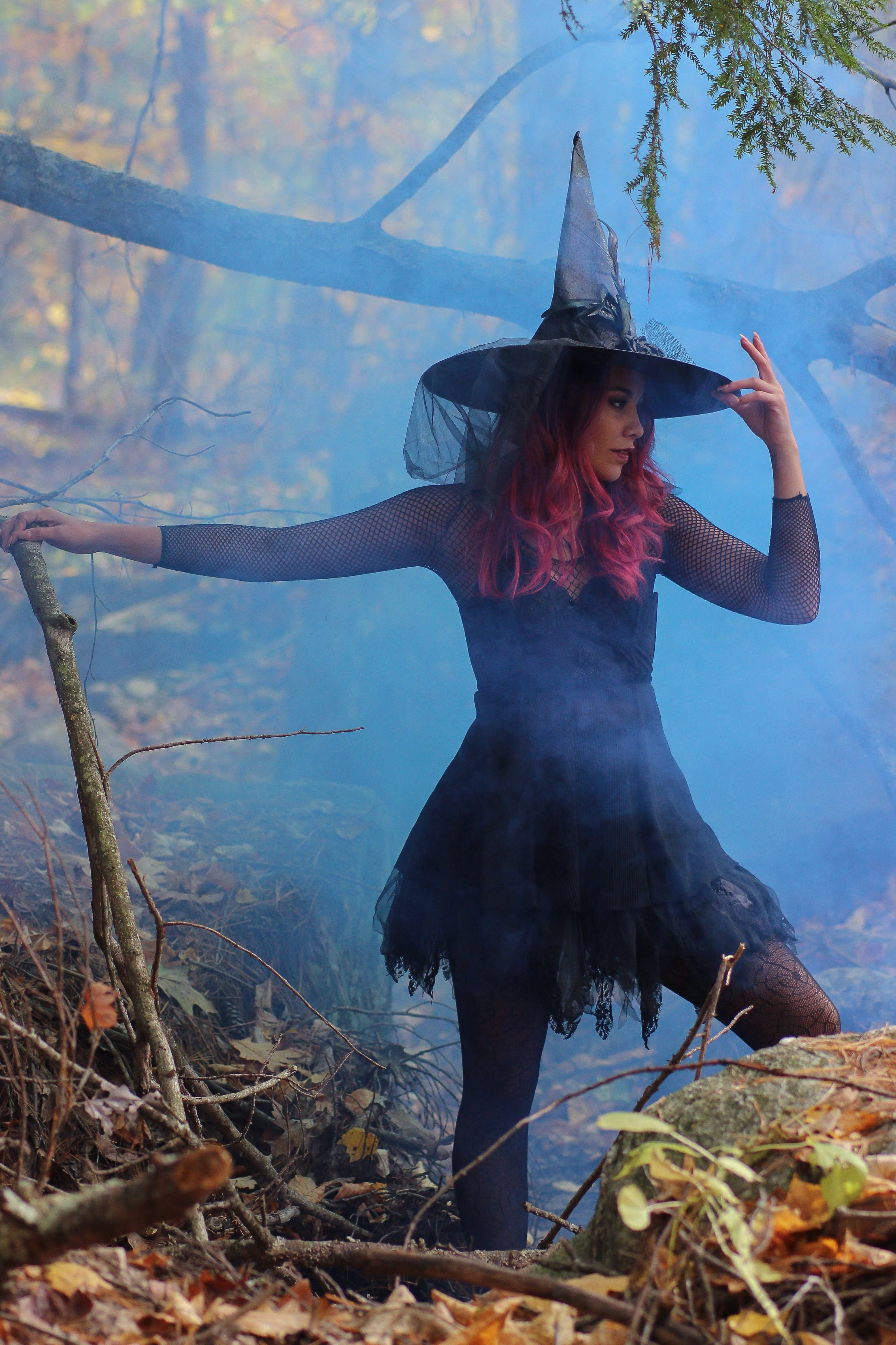 Witch With Blue Smoke Background