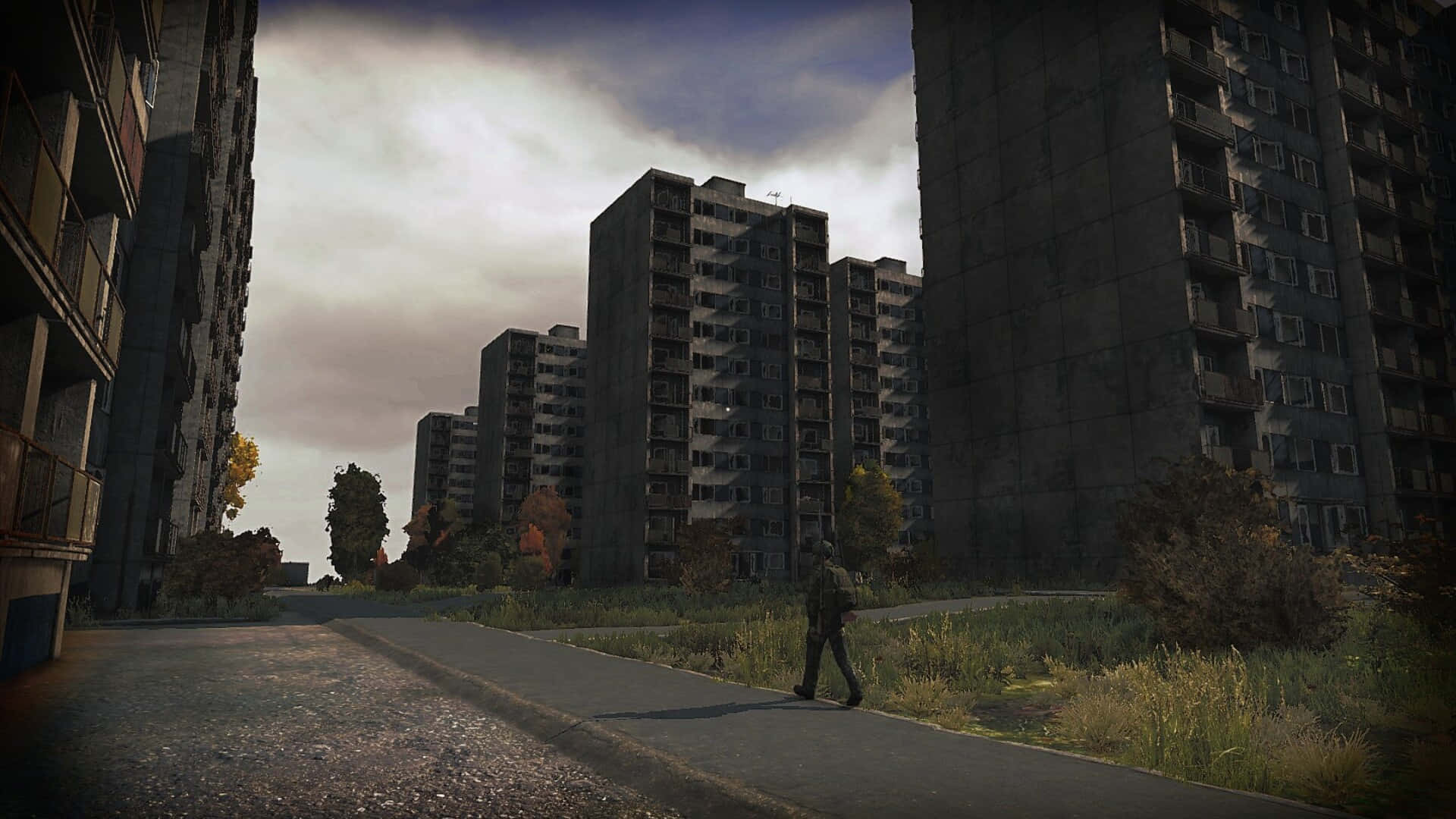 1080pdayz Hintergrund - Mann Geht An Verlassenen Gebäuden Vorbei.