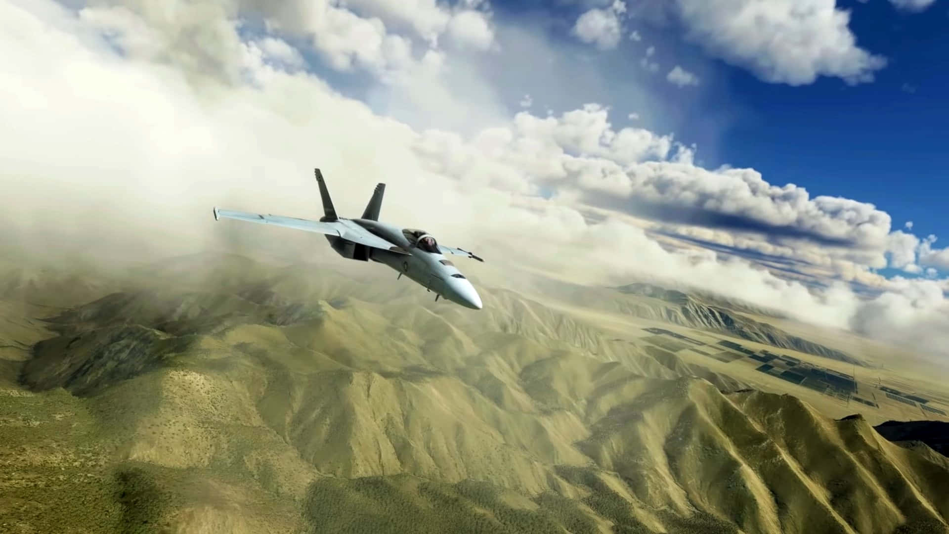 A Jet Fighter Flying Over A Mountain