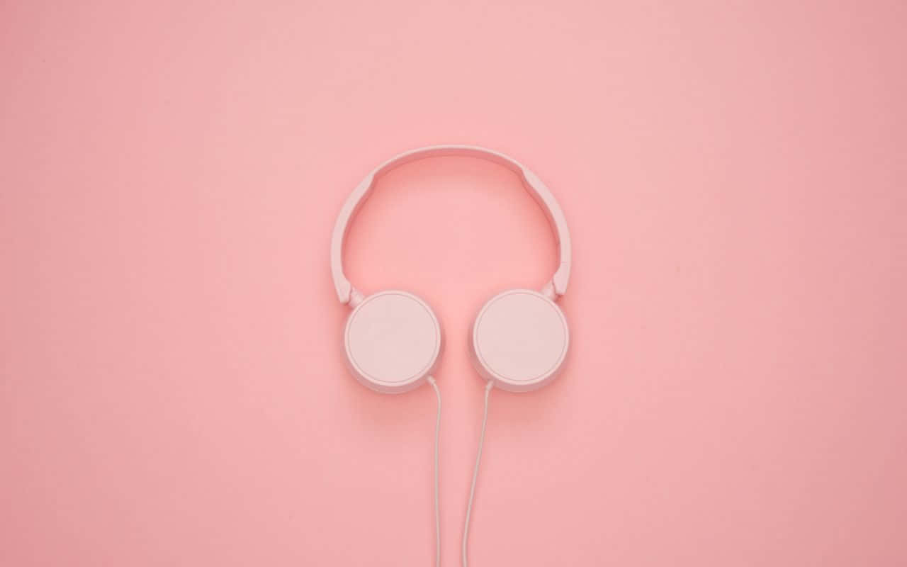 Pink Headphones On A Pink Background Wallpaper