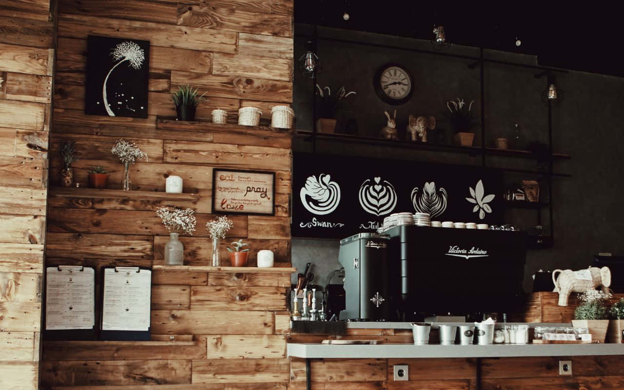 A Coffee Shop With Wooden Walls And A Wooden Counter Wallpaper
