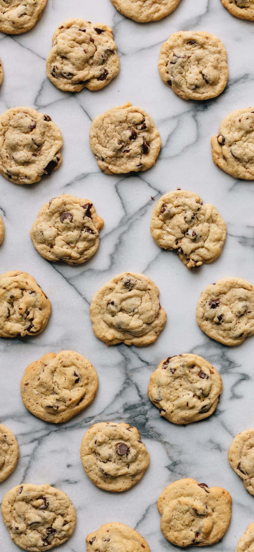 Chocolate Chip Cookies On A Marble Surface Wallpaper