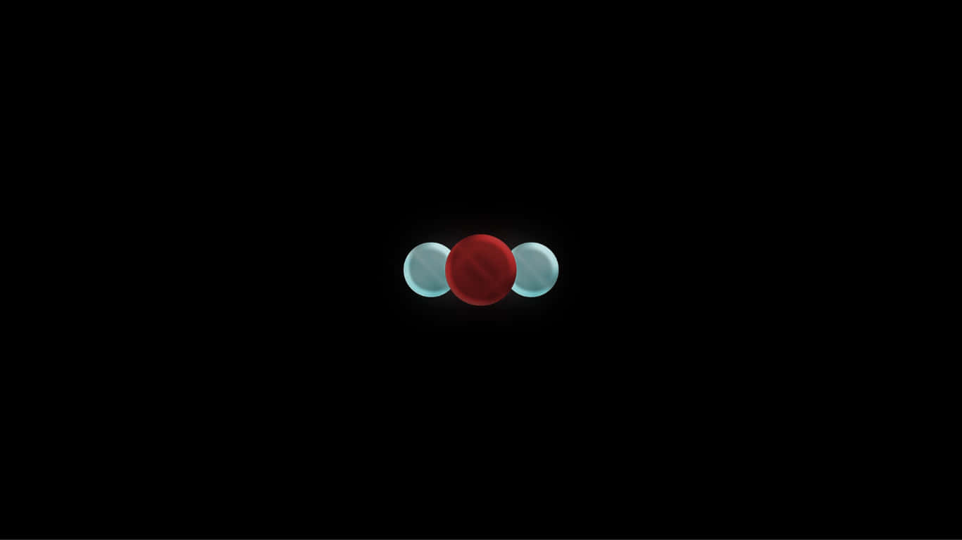 a red and blue ball on a black background
