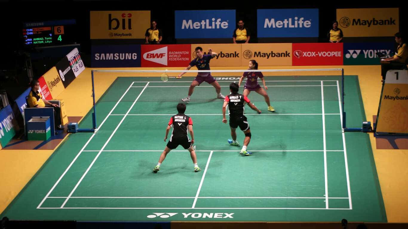 Professional Badminton Players Compete in High-Res 1366x768