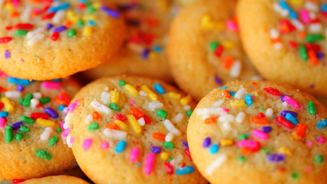 A Close Up Of Colorful Sprinkled Cookies