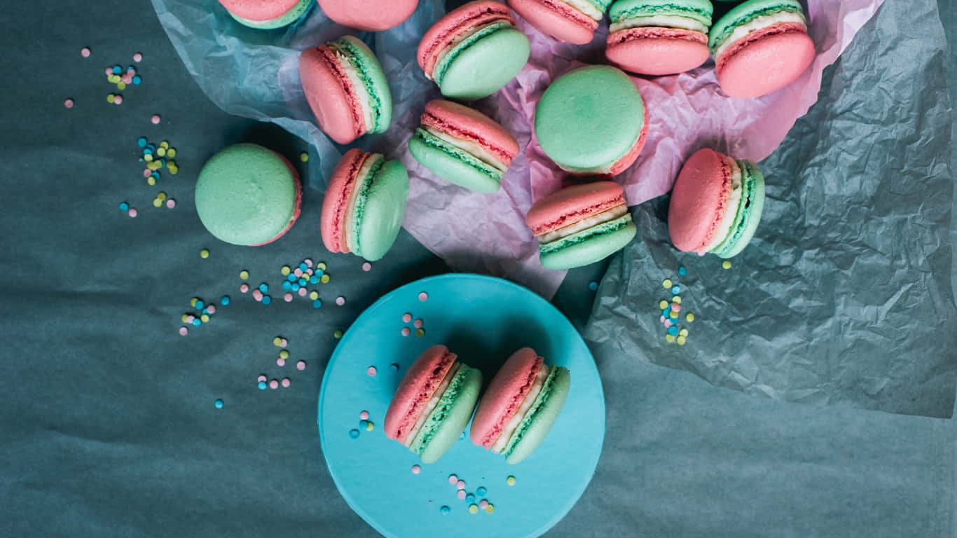 Pink And Green Macarons On A Plate