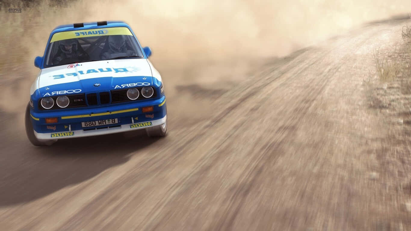 A Blue And White Rally Car Driving On Dirt