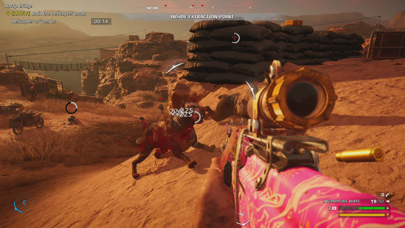 Et spil med en lyserød pistol i ørkenen