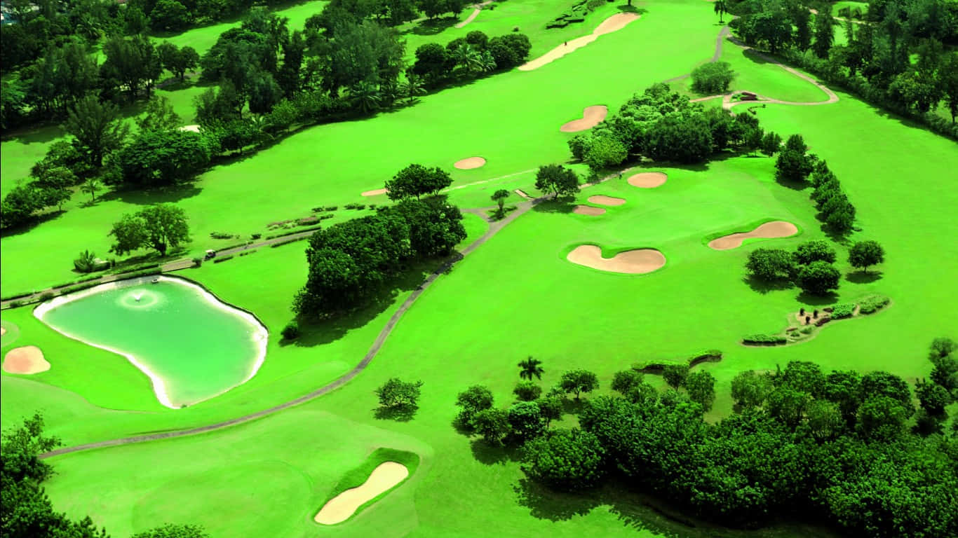 Aerial View of a Lush Green Golf Course Among Rolling Hills