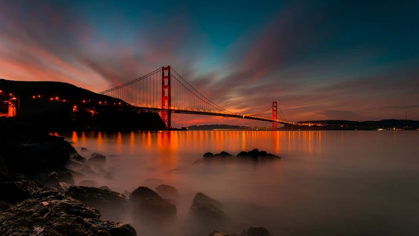 San Francisco's Golden Gate Bridge amidst a beautiful sunset