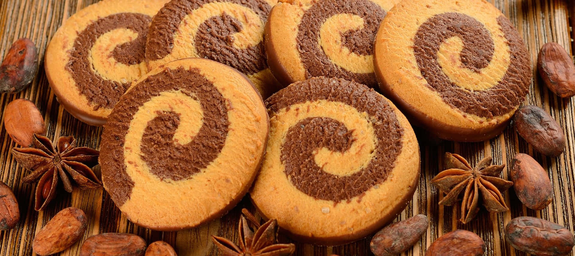A Group Of Cookies With Swirls On Top