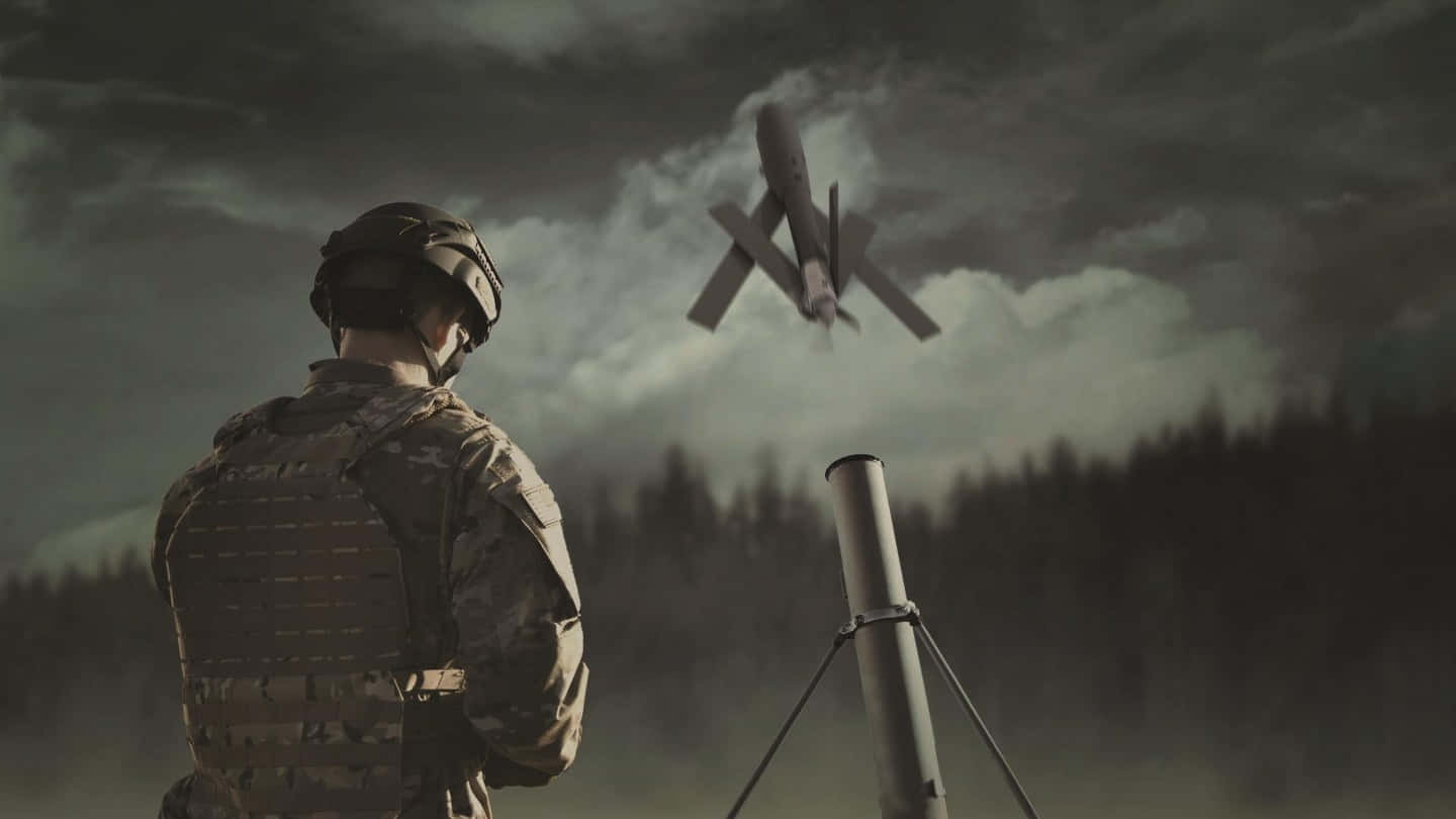 A Soldier Is Looking At A Drone Flying In The Sky