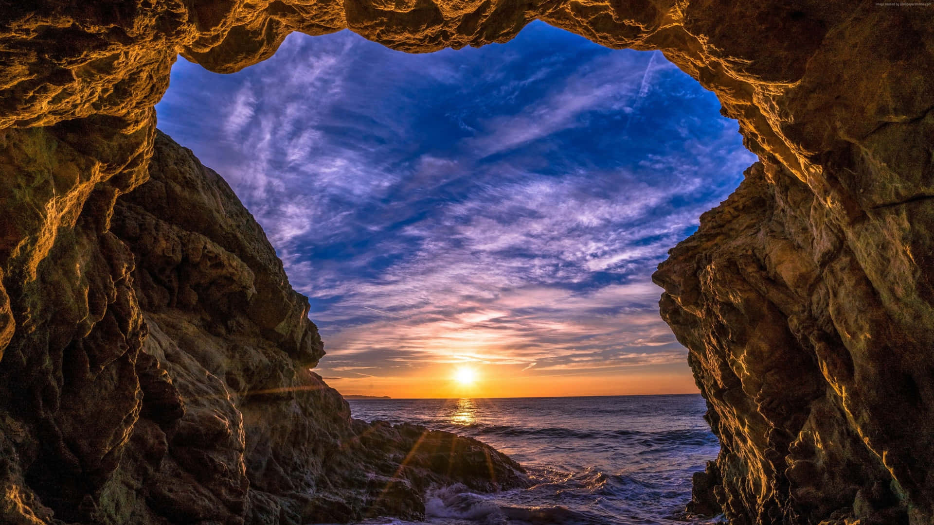 1440p Malibu Cave Opening Sunset Background