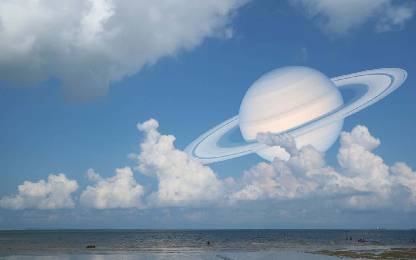 Saturn In The Sky With Clouds Wallpaper
