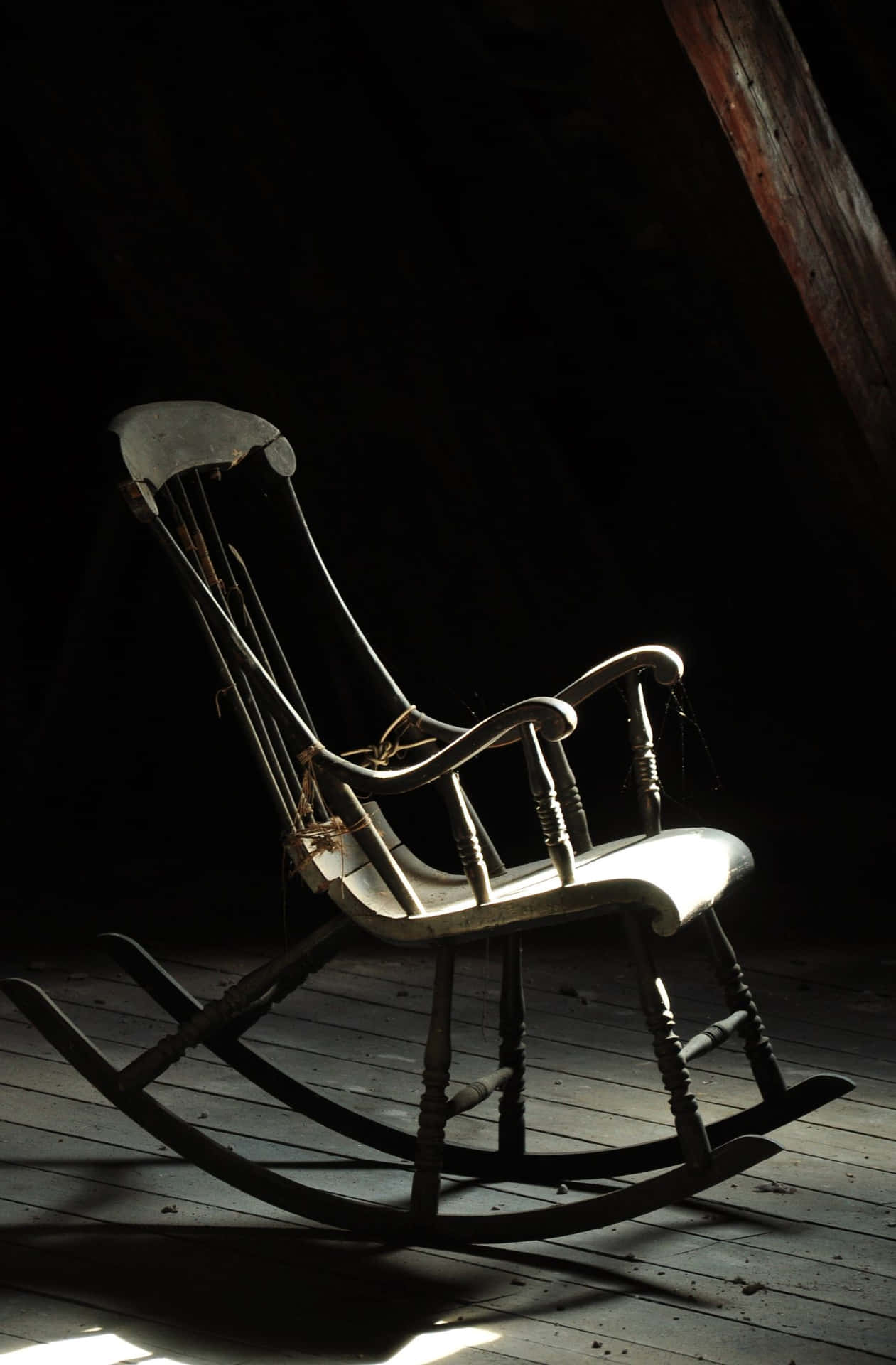 A Rocking Chair In An Attic Wallpaper
