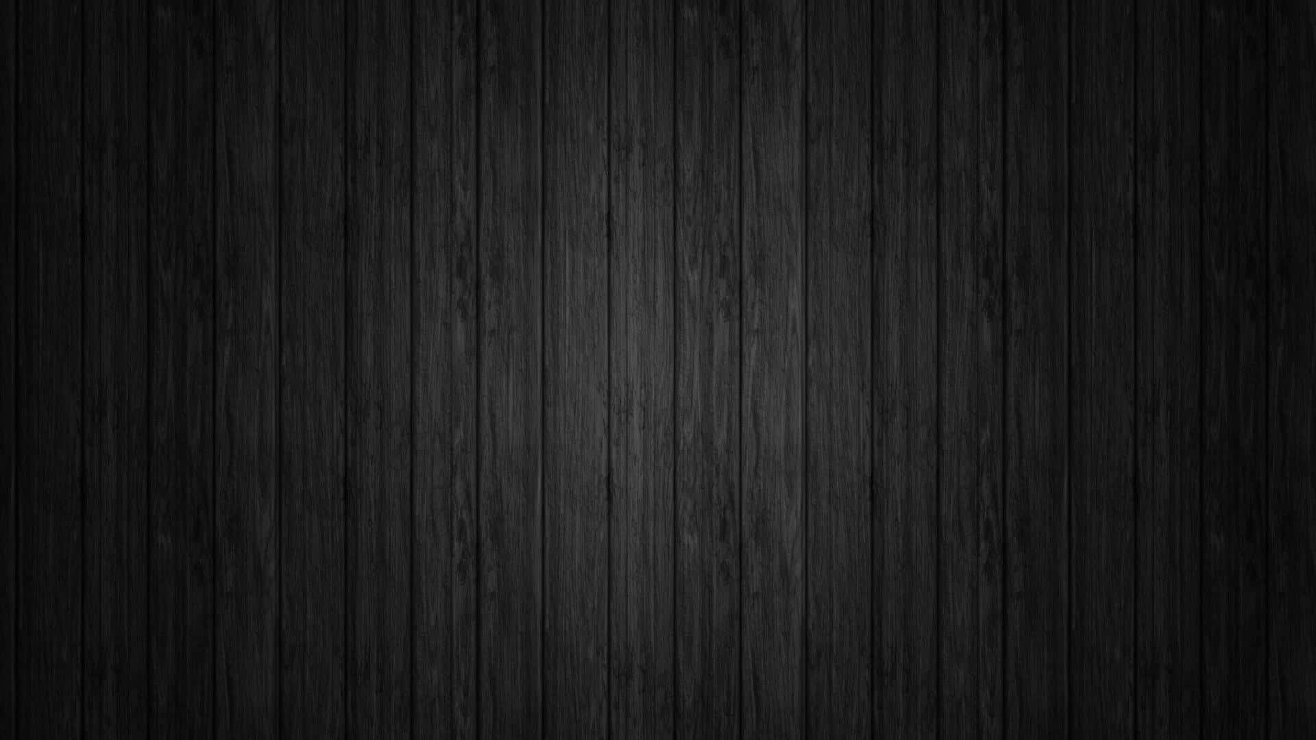 Glossy black background with a sleek texture. Wallpaper