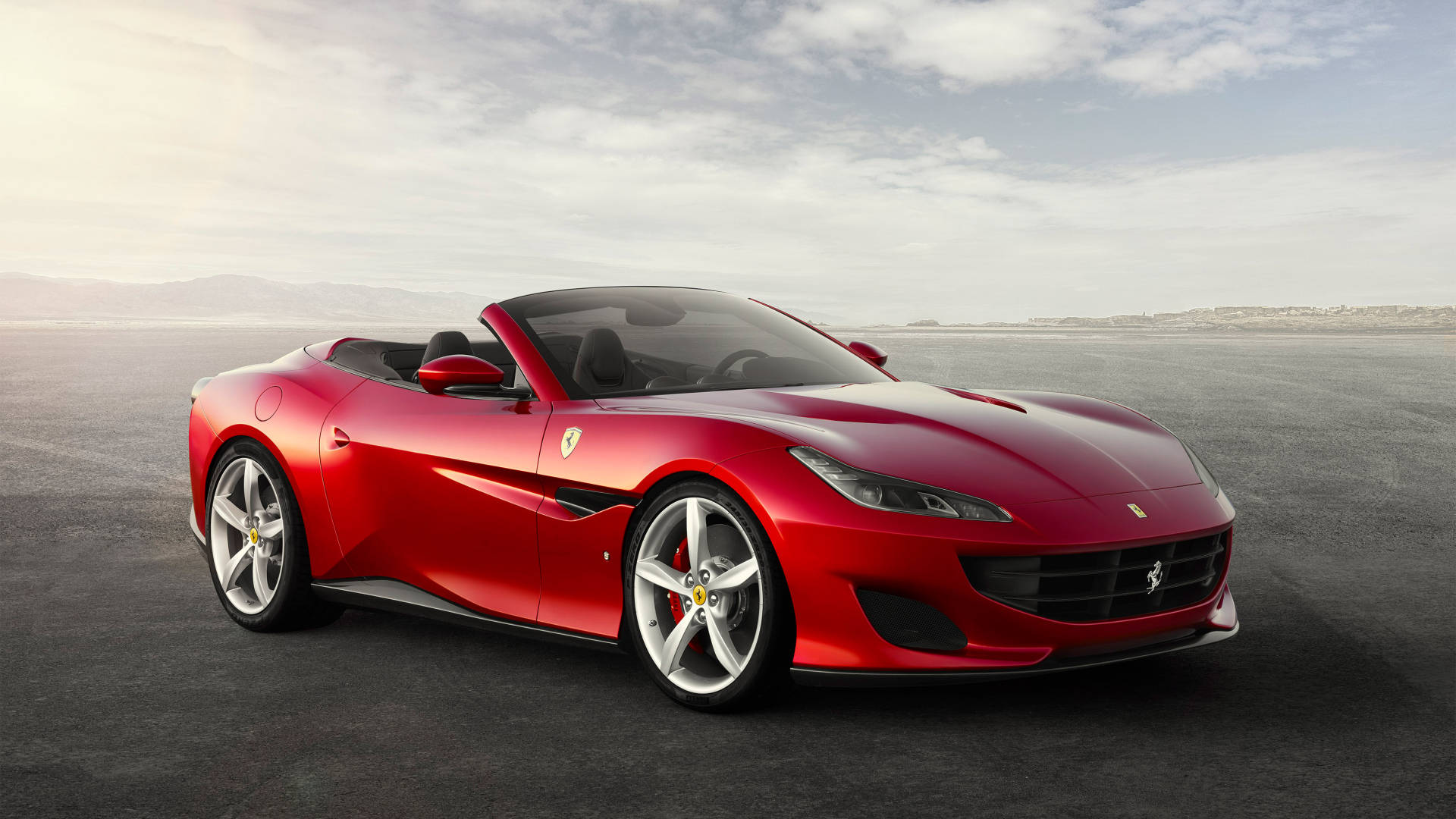 Conducciónhiper-rápida: ¡acompaña Al Ferrari En Su Arranque! Fondo de pantalla