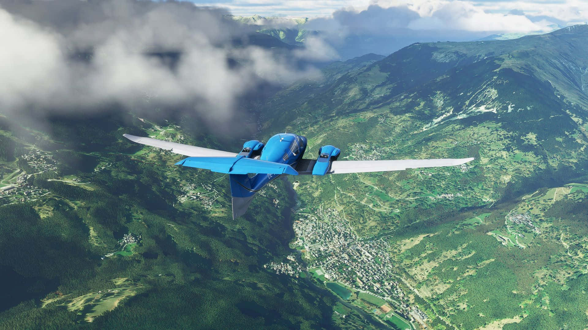 A Blue Airplane Flying Over A Mountain