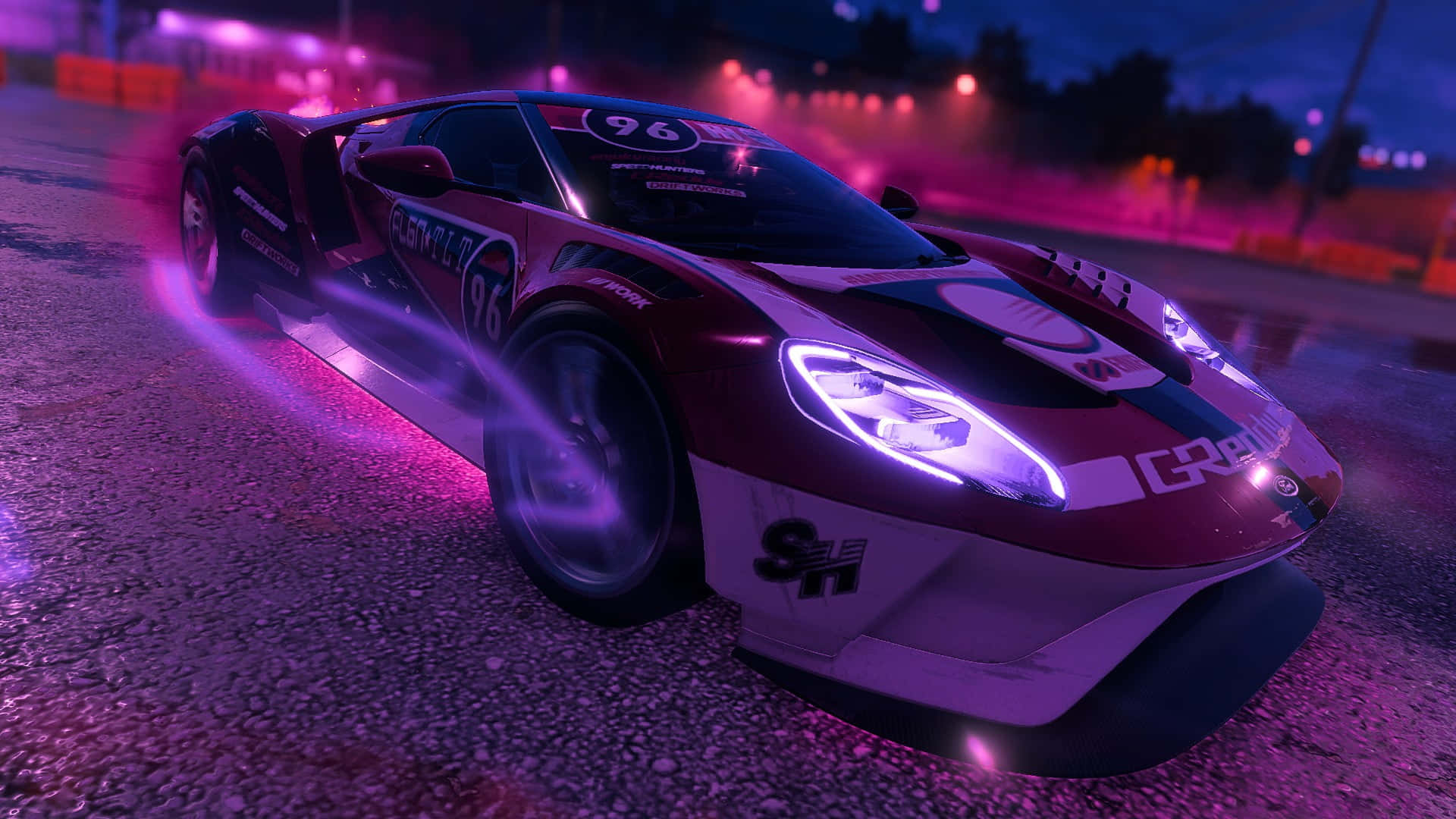 a racing car with purple lights on it
