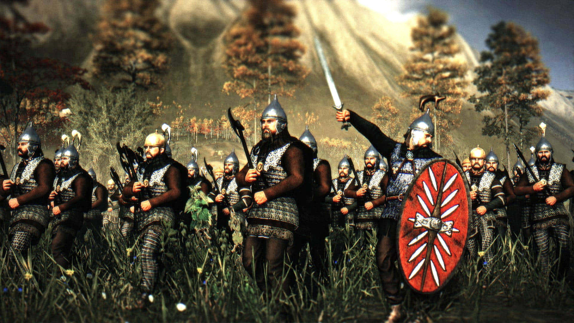A Group Of Men In Armor And Shields Are Standing In A Field