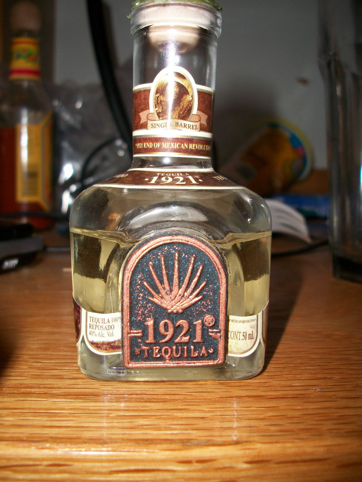 1921 Reposado Tequila On Table Wallpaper