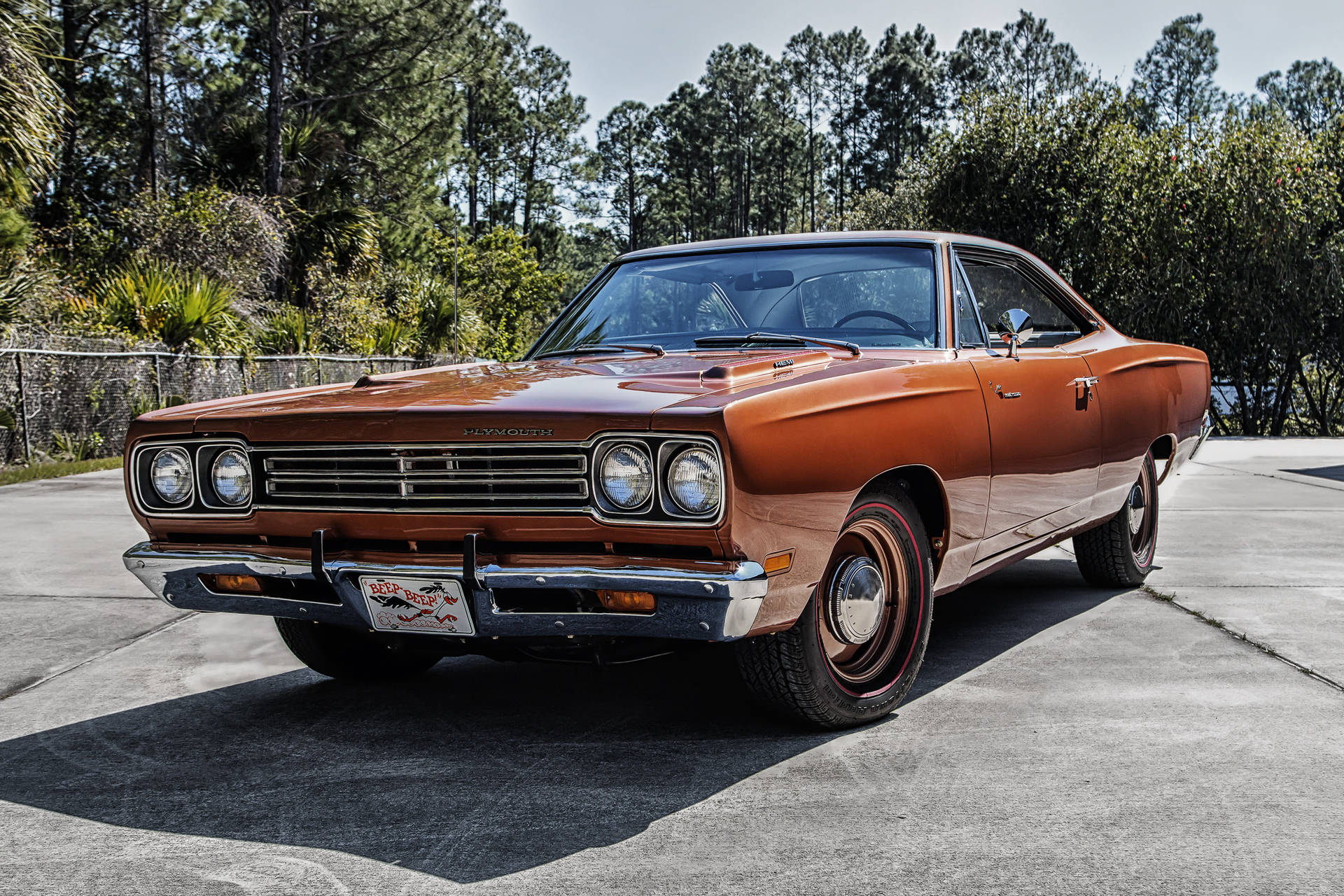 Caption: "Classic 1969 Plymouth Road Runner in a Striking Brown Color" Wallpaper