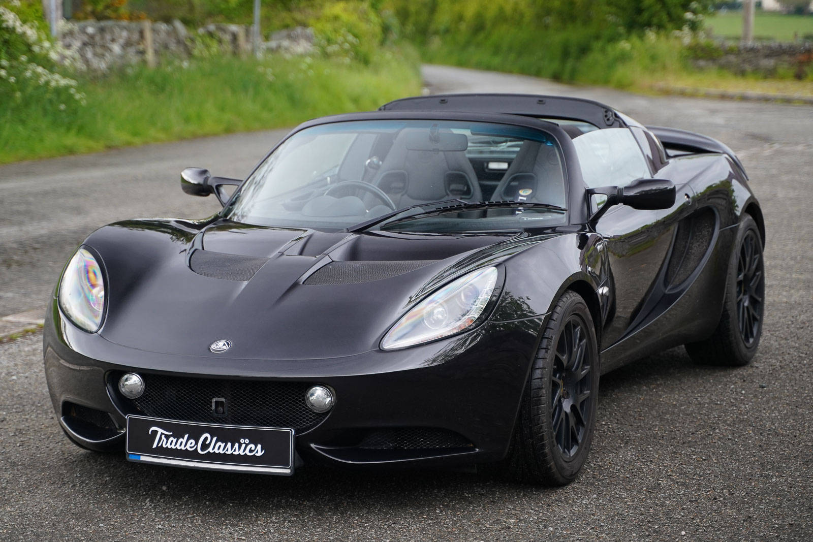 2013 Shiny Black Lotus Elise Convertible Car Wallpaper