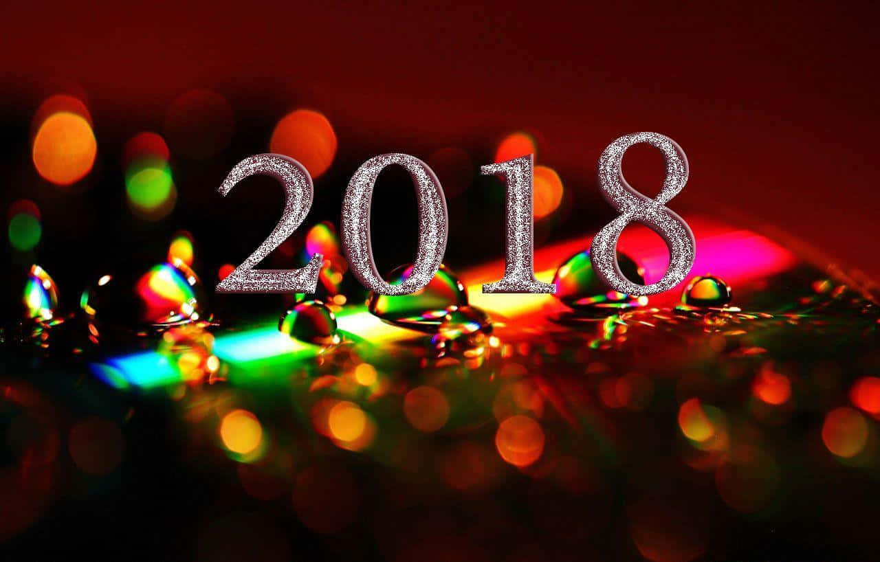 A Colorful Background With The Word 2018