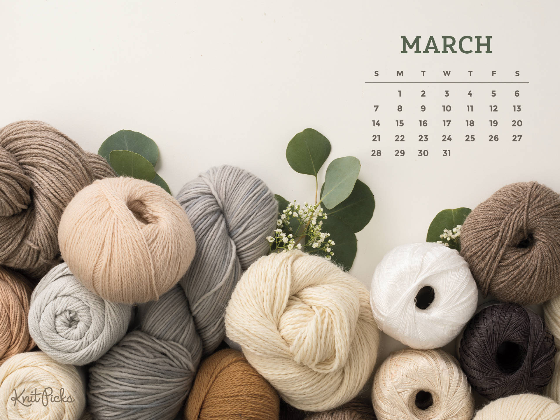 A Calendar With Yarn And Eucalyptus Leaves Wallpaper