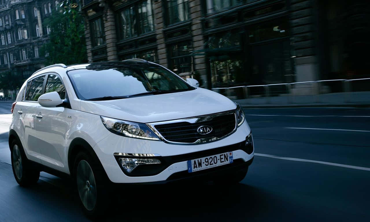 2021 Kia Sportage In Dynamic Urban Setting Wallpaper