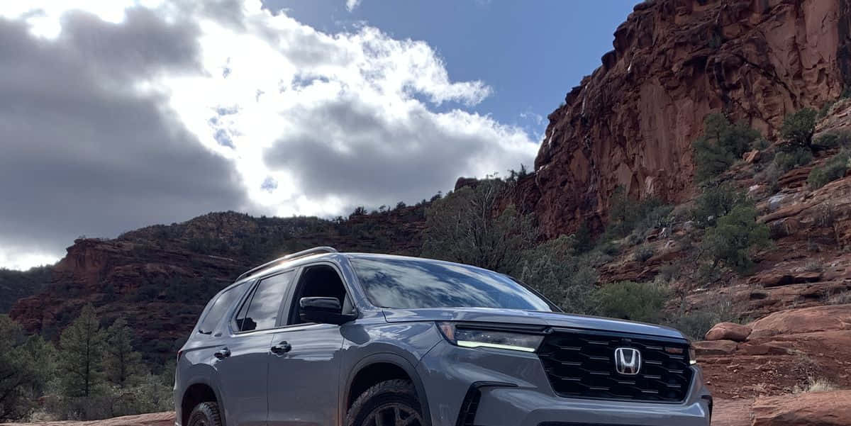 The 2020 Honda Pilot Is Parked On A Rocky Road