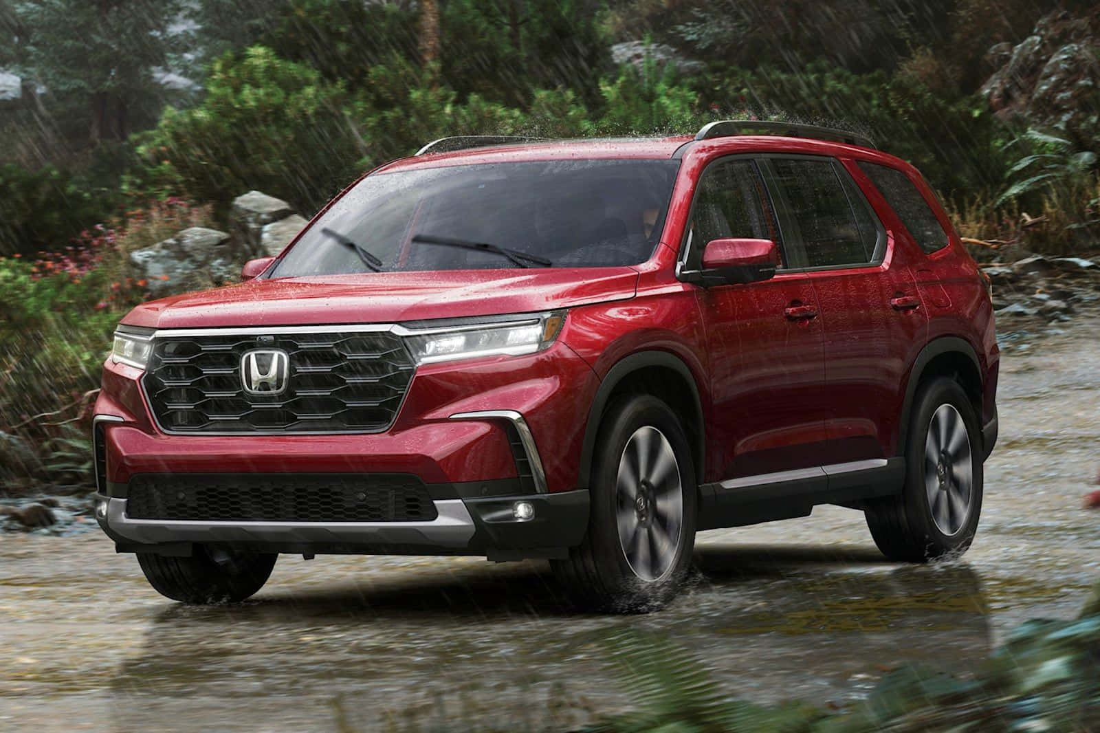 The Red 2020 Honda Pilot Is Driving Through The Forest