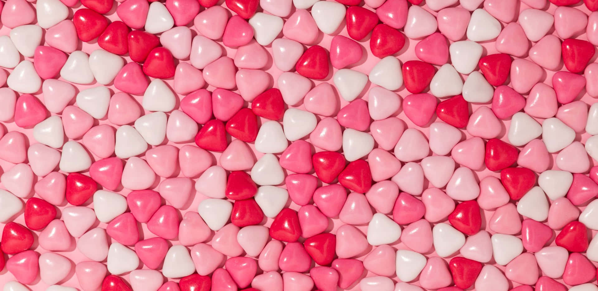 Pink And White Pebbles On A Wall Wallpaper
